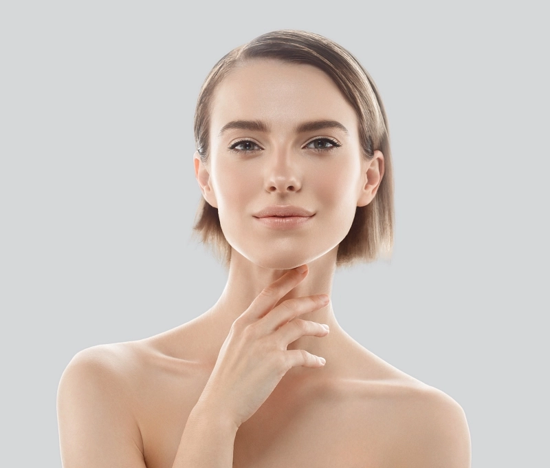 Woman with clear skin and structured jawline