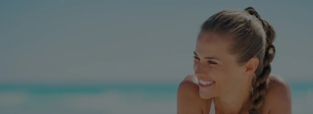 happy beautiful woman at the beach