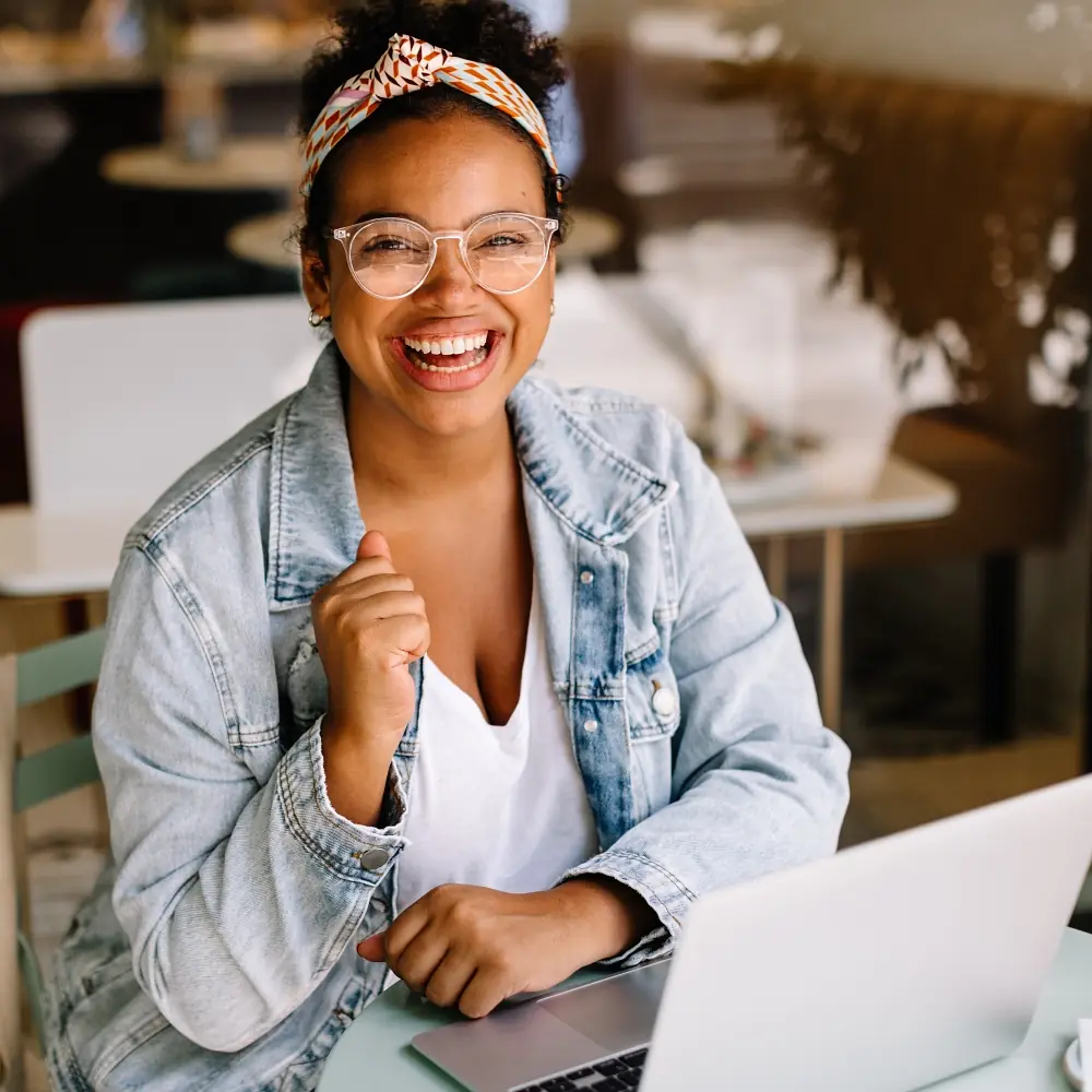Happy woman smiling after being approved for financing